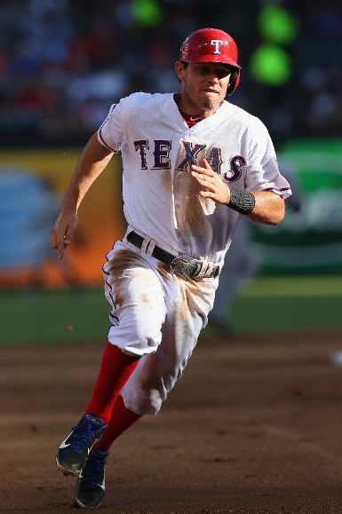 Ian Kinsler races home on a single, shortly after recording his record-setting 163rd stolen base (Ronald Martinez/Getty Images)