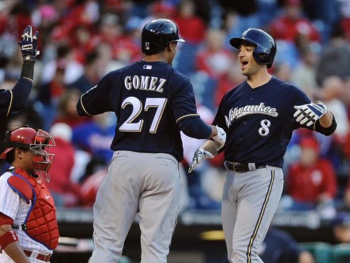 Ryan xxx Braun celebrates the last of three HRs Tuesday with Carlos xxx Gomez. (AP Photo/Michael xxx Perez)